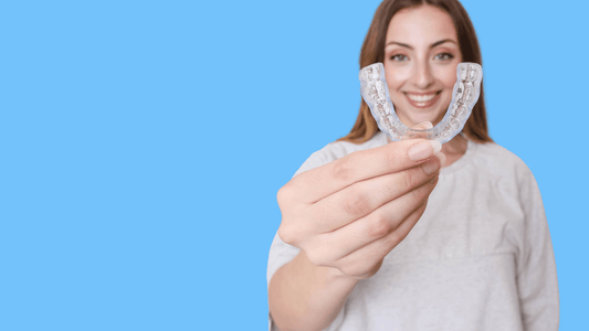 Lady holding SayCheeseClub custom night guard