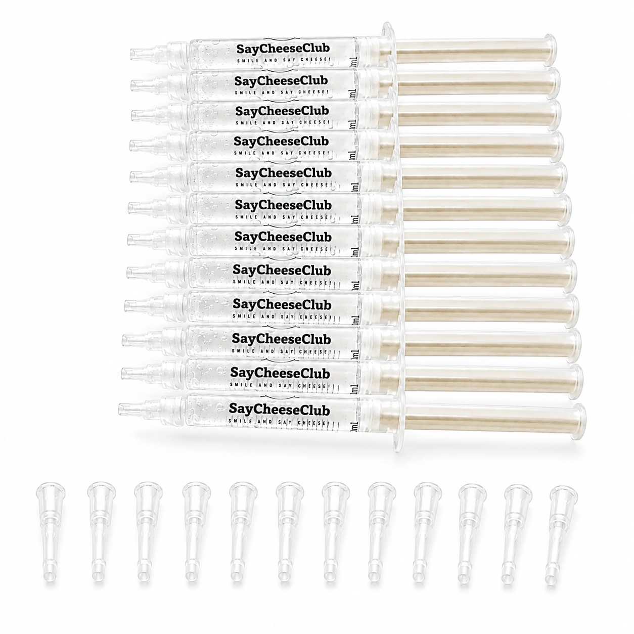 A set of twelve clear plastic syringe-style containers labeled SayCheeseClub, arranged in a row above ten matching clear applicator tips on a white background.