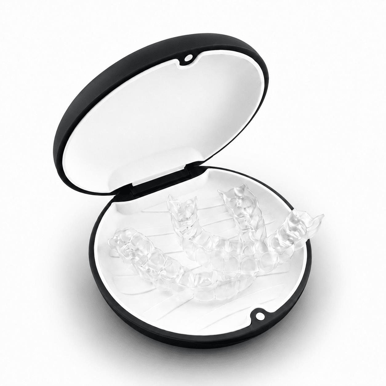 A clear set of transparent dental mouthguards displayed inside an open black and white oval case on a white background.