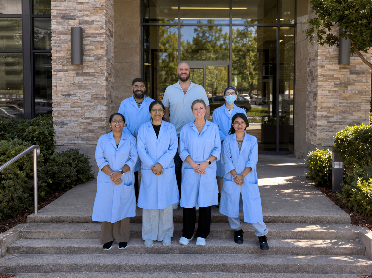 The SayCheeseClub team standing outside together in Plano, Texas