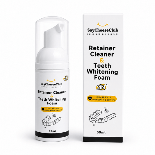 SayCheeseClub Retainer Cleaner & Teeth Whitening Foam shown as a white pump bottle next to its white retail box on a clean white background.