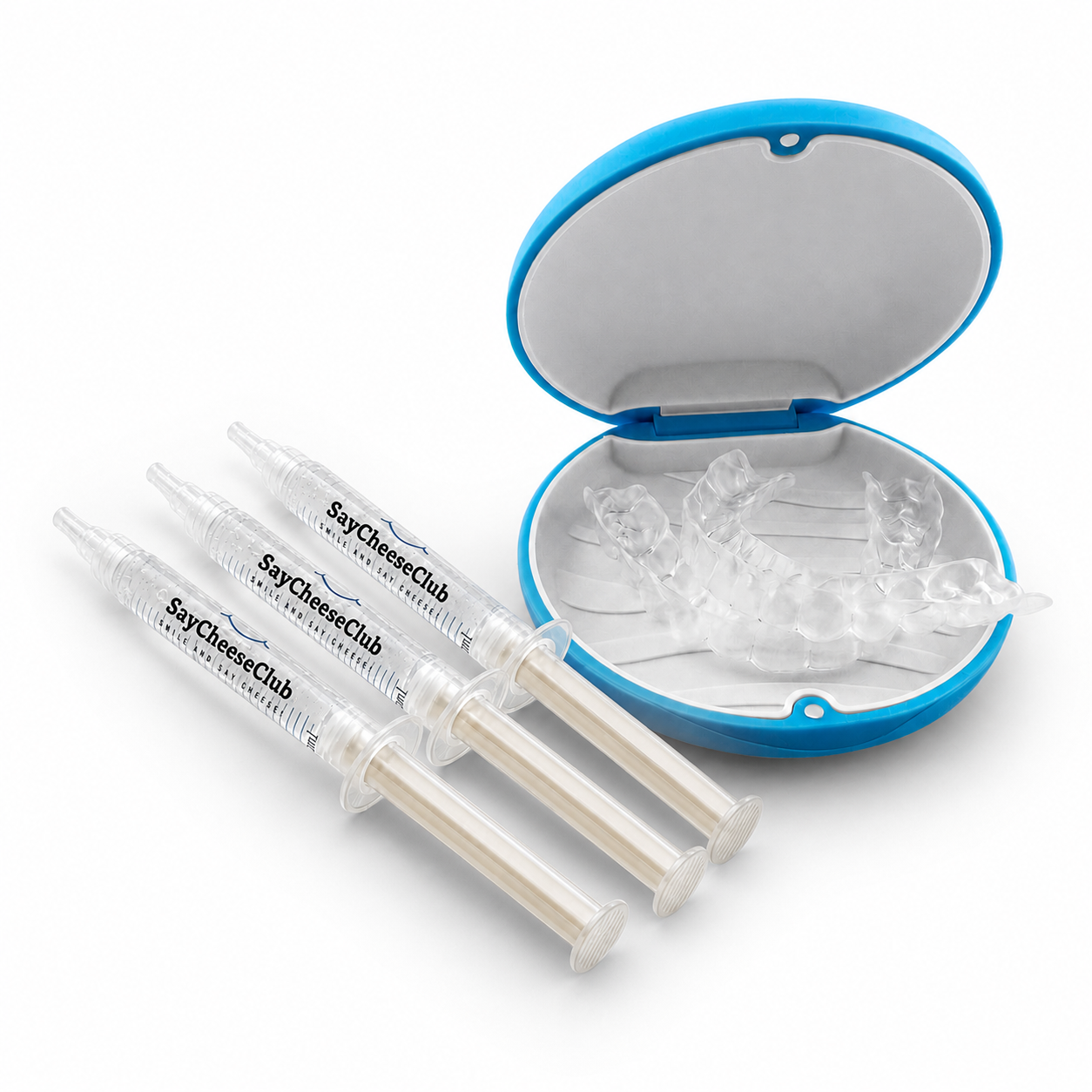 Two clear dental trays inside an open blue and white hard case, with two clear syringe-style applicators labeled SayCheeseClub Whitening Gel placed in front on a white background.