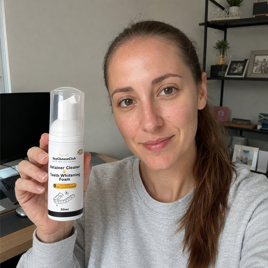 Woman holding Cleaner and Whitening Foam at home