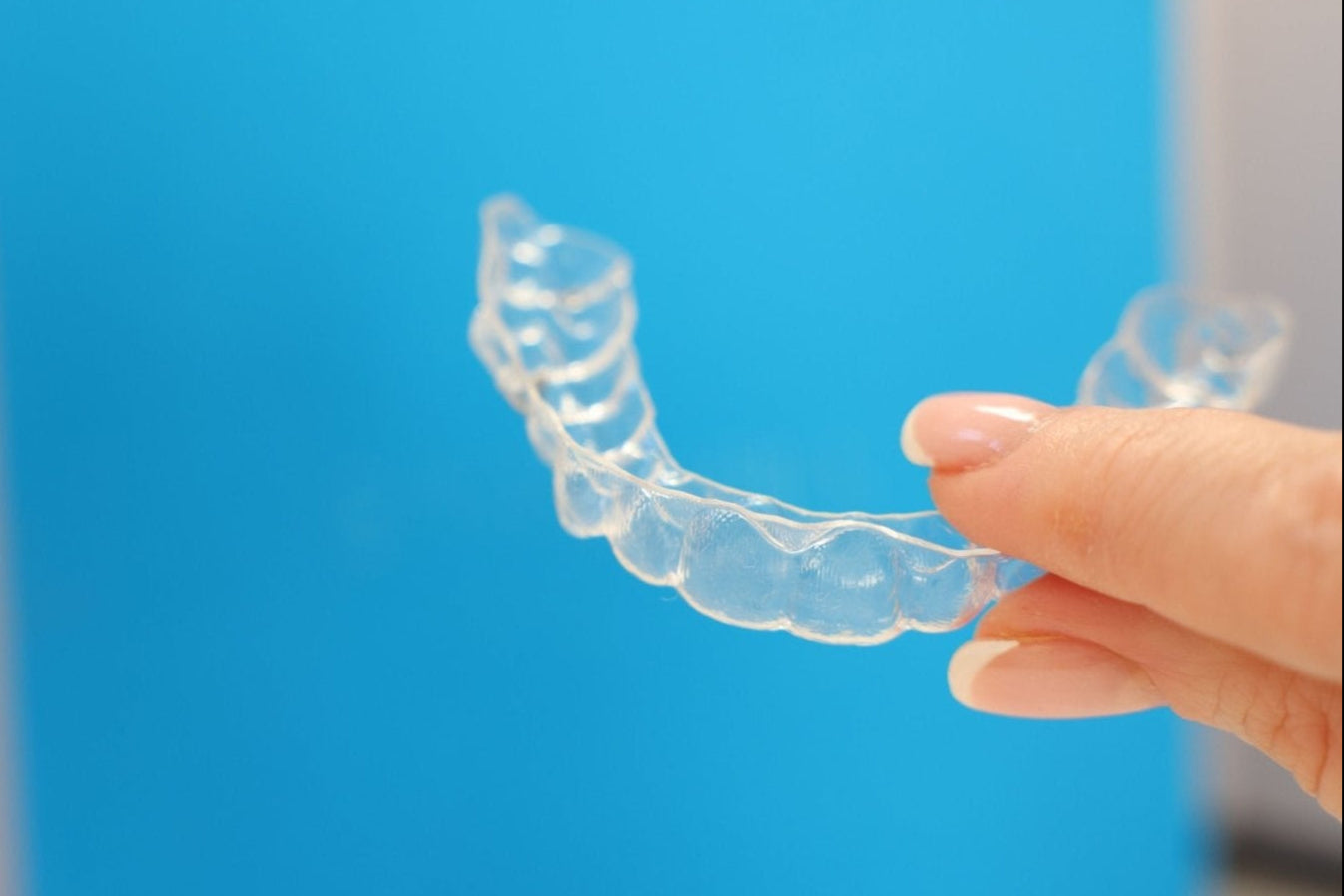 Custom upper clear dental orthodontic retainer designed to maintain teeth alignment and prevent shifting after orthodontic treatment.